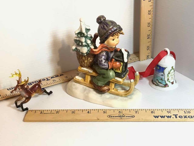 lot 383 image: Goebel Hummel 1971 396-I Boy on Sled, Christmas Bell Ornament, Reindeer Glass Ornament