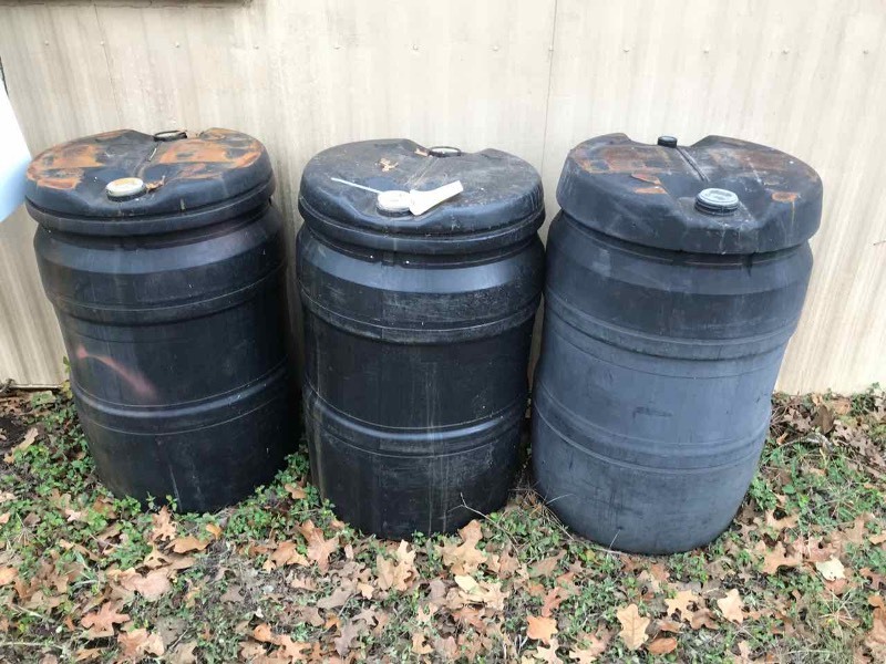 lot 725 image: (3) Black Plastic Barrels