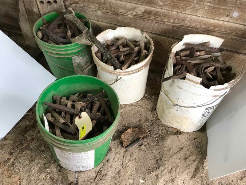 lot 817 image: (4) Buckets of Railroad Spikes, Horse Shoes, Cable