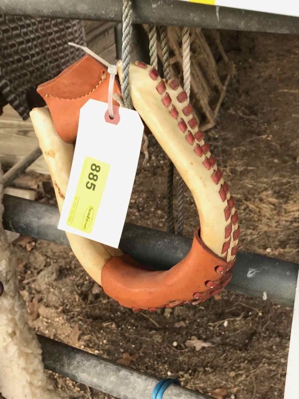 lot 885 image: Pair of Stirrups (rawhide covered)
