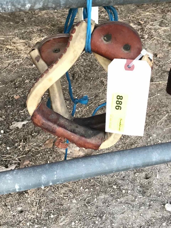 lot 886 image: Pair of Stirrups (rawhide covered)