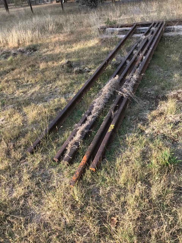 lot 908 image: (5) Railroad Iron Rails