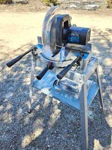 lot 70 image: Delta Mod. 36-075  10 inch Compound Miter Saw with Stand