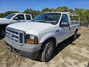 lot 9 image: Surplus  2006 Ford F250, LWB, RKI Tool Box, Ladder Rack, lift gate  mileage 89,208  (VIN  1FTNF20566EC74746)
