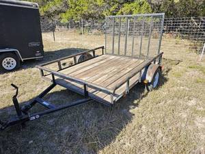lot 14 image: Flatbed Utility Trailer with ramp gate. (VIN  4YMBU0814HT038929)