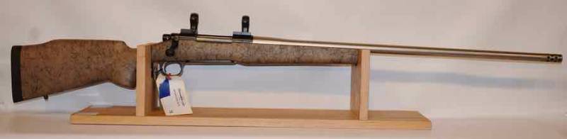 lot 76 image: Remington Mod. 700 Custom Bolt Rifle wbrake,  300 Win Mag, Stainless 27 barrel  (sn  E6519948)  used
