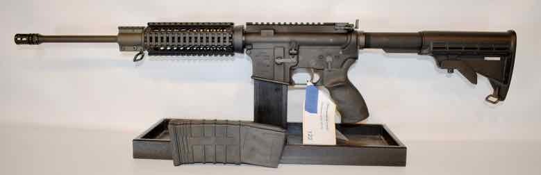 lot 122 image: Rock River Arms  Mod. LAR-15,  semi-auto rifle,  5.56 cal,  16 bbl  (sn  CM133257)  used
