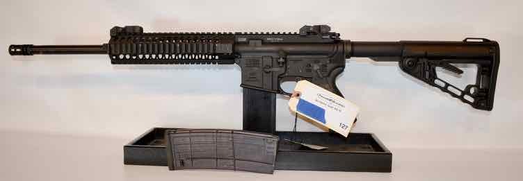 lot 127 image: LWRC International,  Mod. M6A2, semi-auto,  5.56 cal NATO,  16 bbl,  piston,  one magazine  (sn  03-00588) used