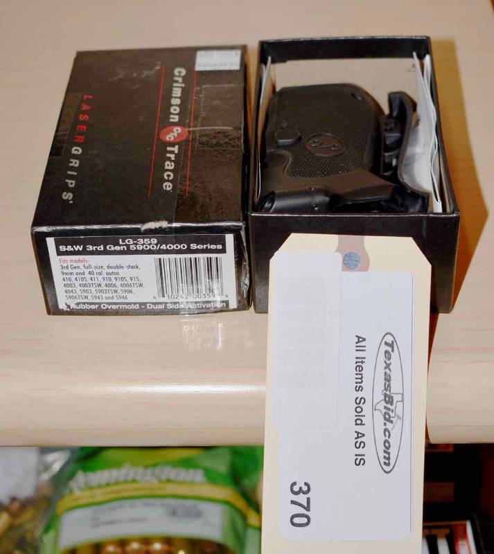 lot 370 image: Crimson Trace Laser Grips