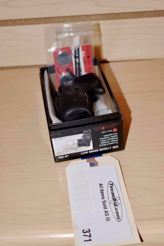 lot 371 image: Crimson Trace Laser Grips