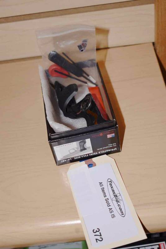 lot 372 image: Crimson Trace Laser Grips