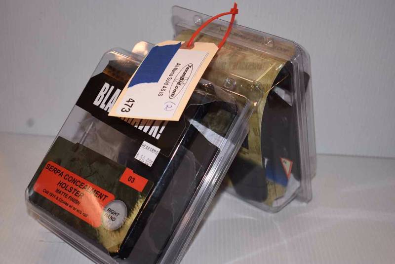 lot 473 image: (2)Holsters Blackhawk & Taurus