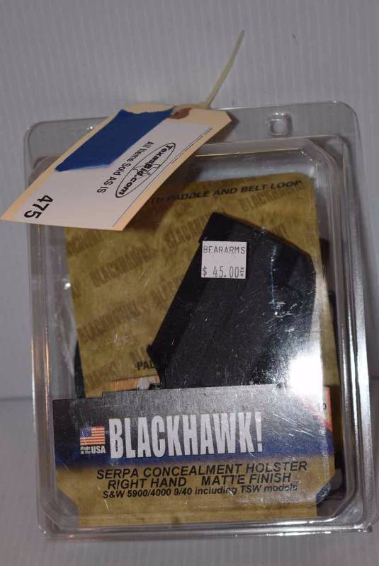 lot 475 image: (1) Blackhawk Holster