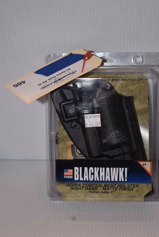 lot 486 image: (1) Blackhawk Holster