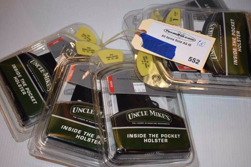 lot 552 image: (5)Uncle Mikes Holsters