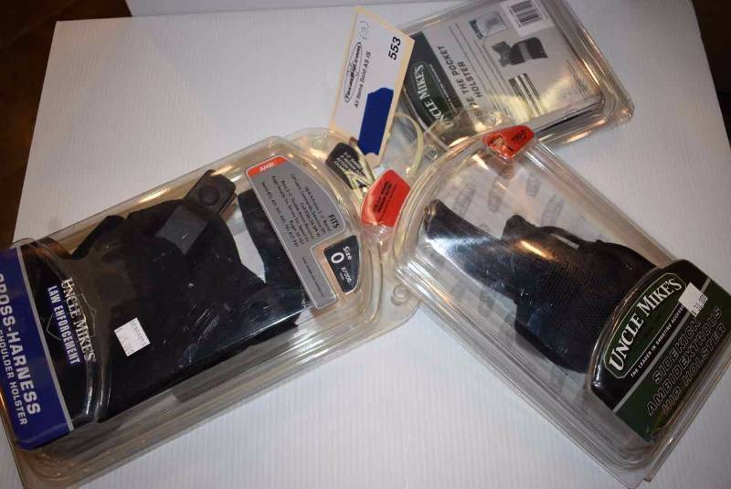lot 553 image: (3)Uncle Mikes Holsters