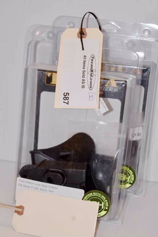 lot 587 image: (2)Tagua Holsters