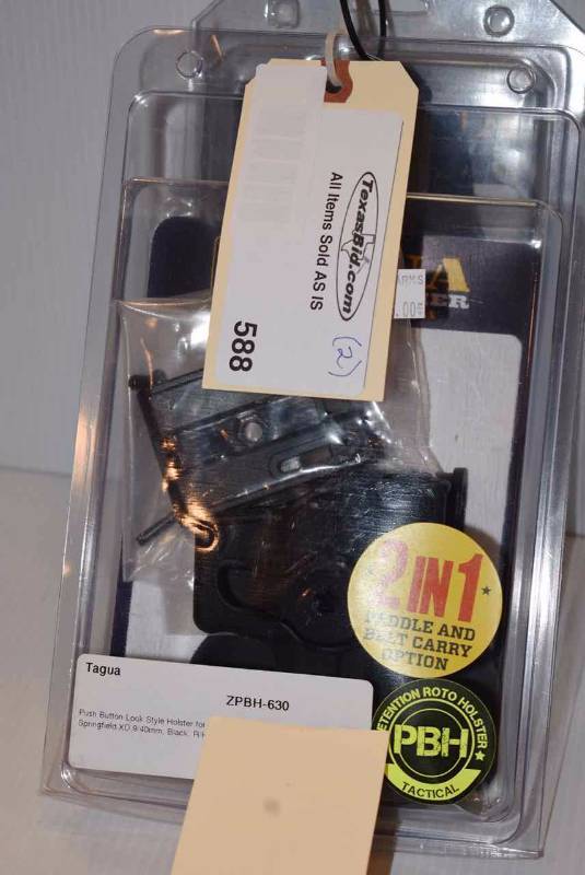 lot 588 image: (2)Tagua Holsters