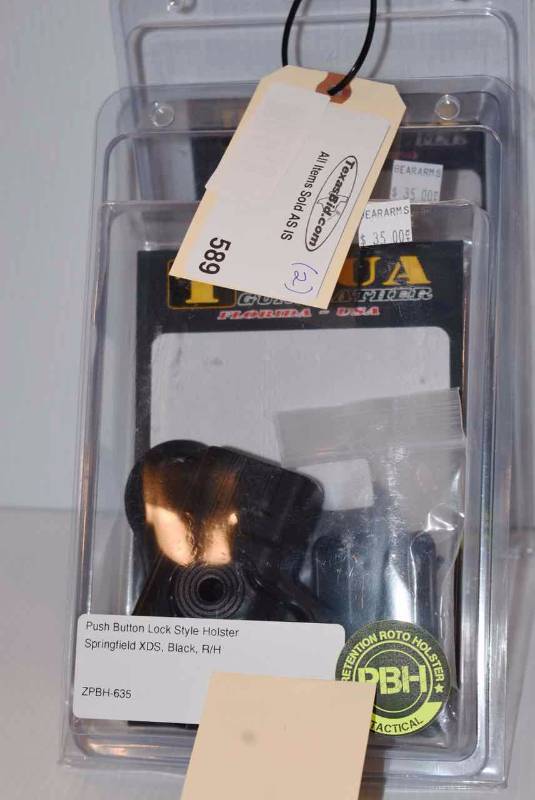 lot 589 image: (2)Tagua Holsters