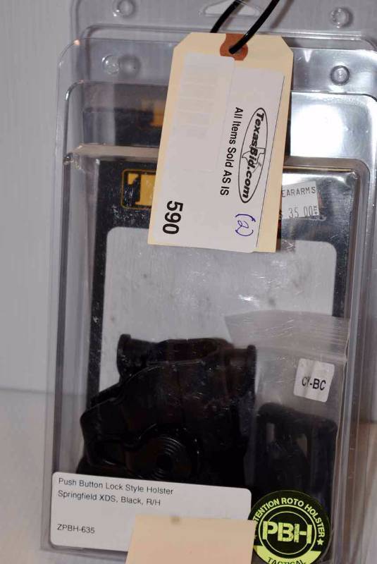 lot 590 image: (2)Tagua Holsters