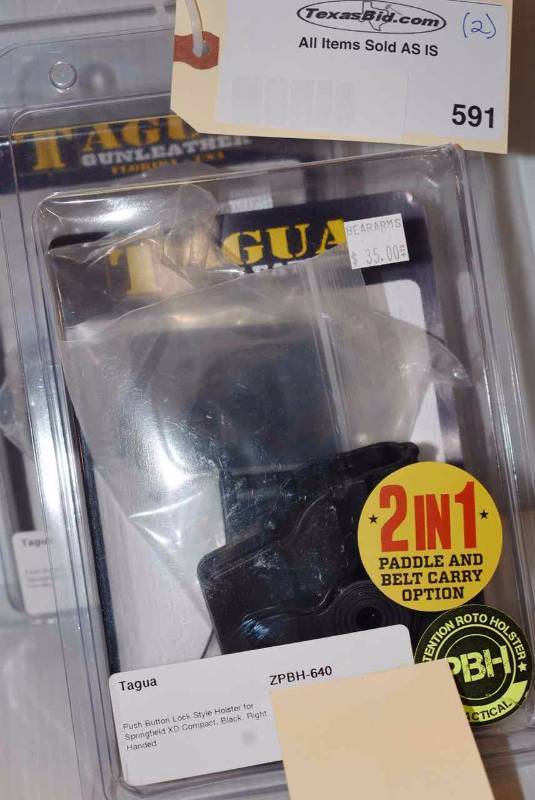 lot 591 image: (2)Tagua Holsters