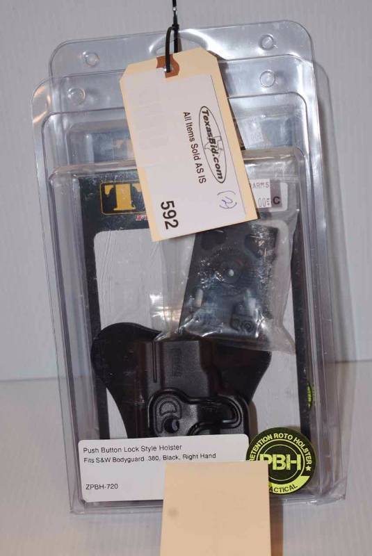 lot 592 image: (2)Tagua Holsters