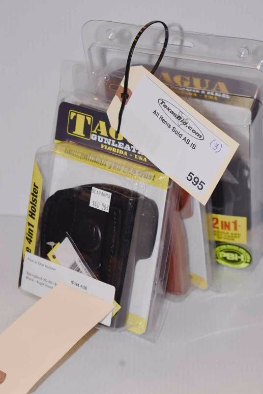 lot 595 image: (3)Tagua Holsters