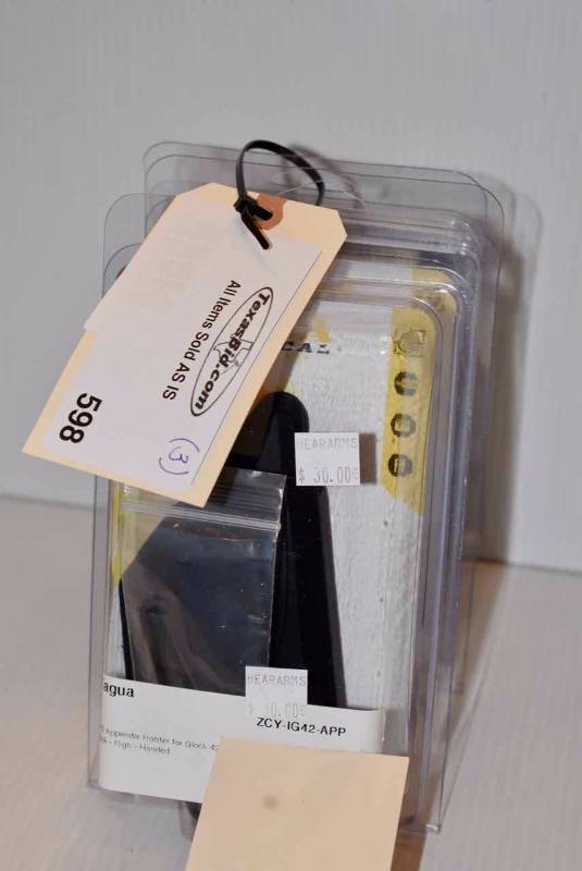 lot 598 image: (3)Tagua Holsters