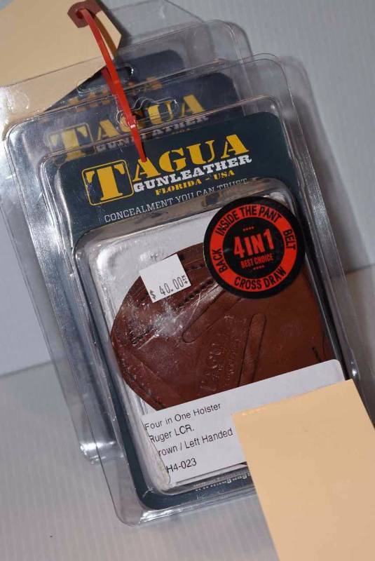 lot 600 image: (3)Tagua Holsters