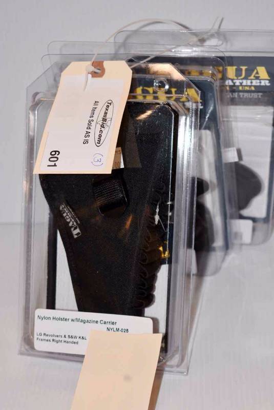 lot 601 image: (3)Tagua Holsters