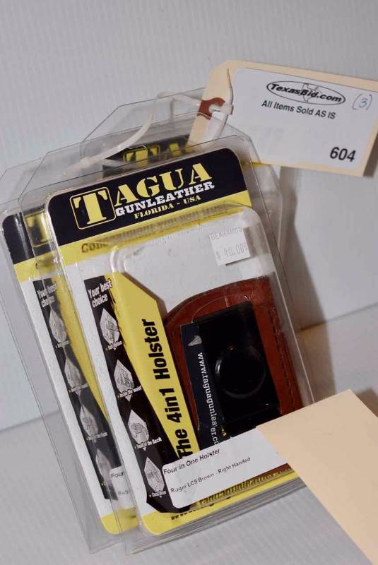 lot 604 image: (3)Tagua Holsters