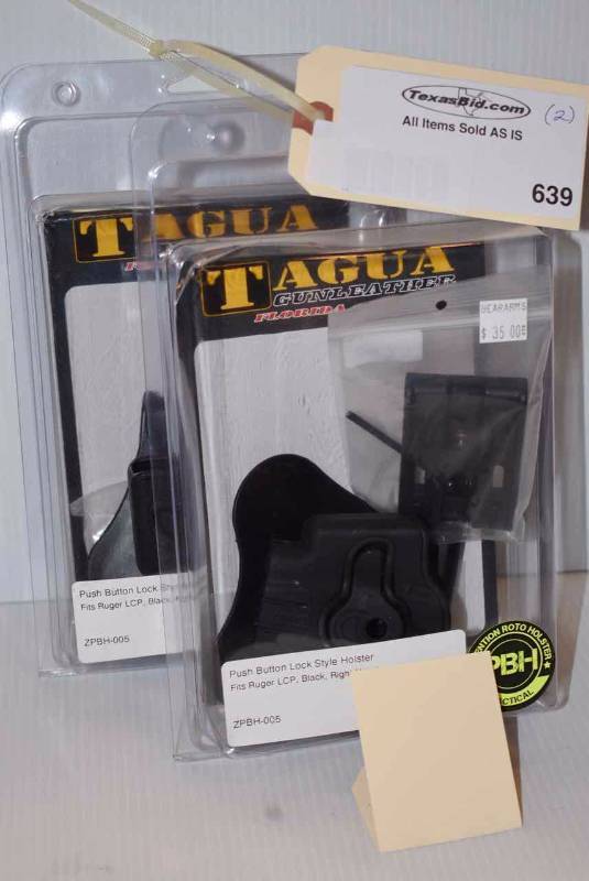 lot 639 image: (2)Tagua Holsters