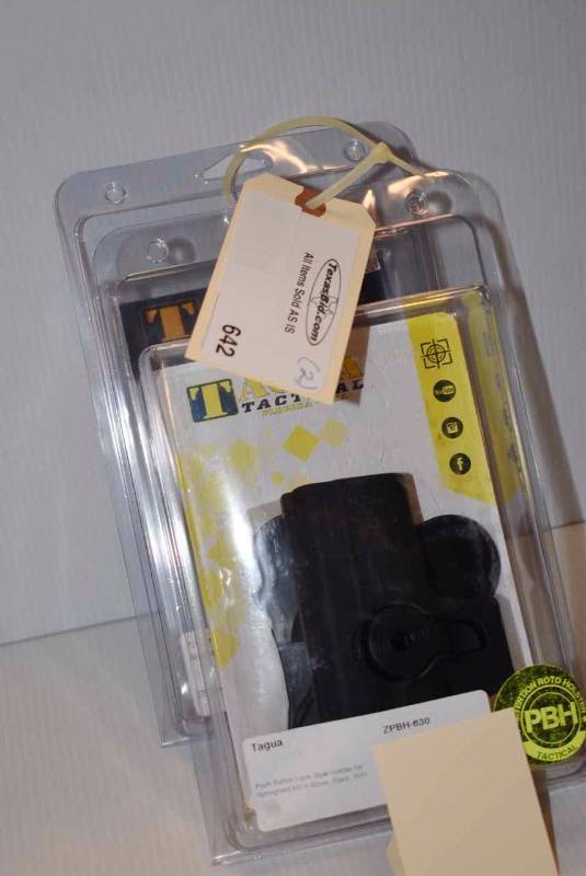 lot 642 image: (2)Tagua Holsters