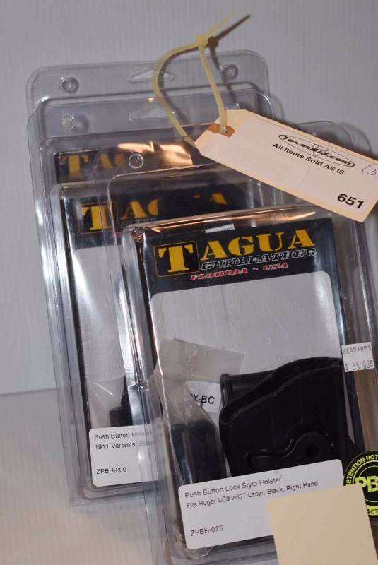 lot 651 image: (3)Tagua Holsters