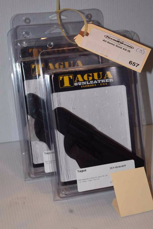 lot 657 image: (3)Tagua Holsters
