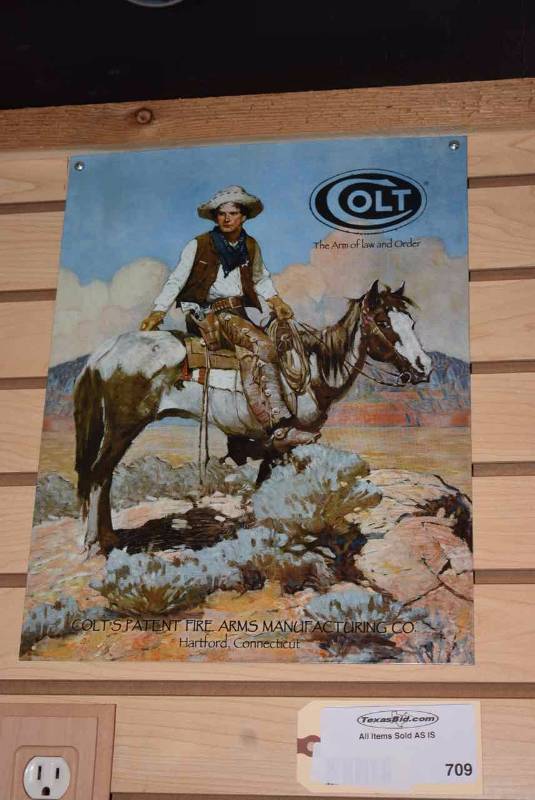 lot 709 image: Tin Sign Colt