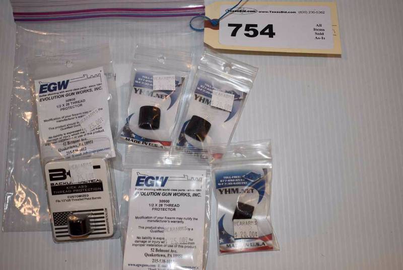 lot 754 image: (6) Thread Protectors