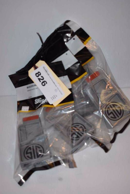 lot 826 image: (4)Sig Sauer Mag-Block 556