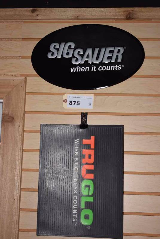 lot 875 image: Tin Sign Oval Sig & TruGlo Rubber Pad