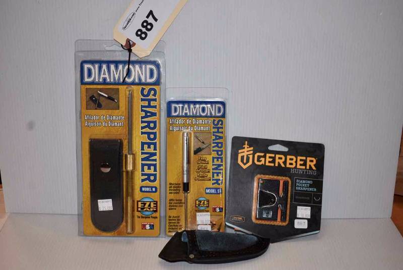 lot 887 image: Sharpeners & a Sheath