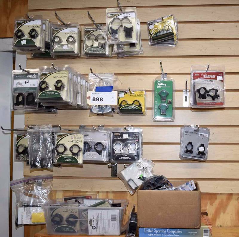 lot 898 image: Wall Contents Scope Rings, Connectors, Triggers, Etc.
