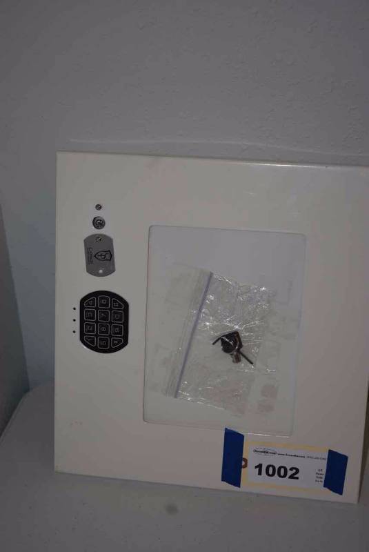 lot 1002 image: Wall Safe