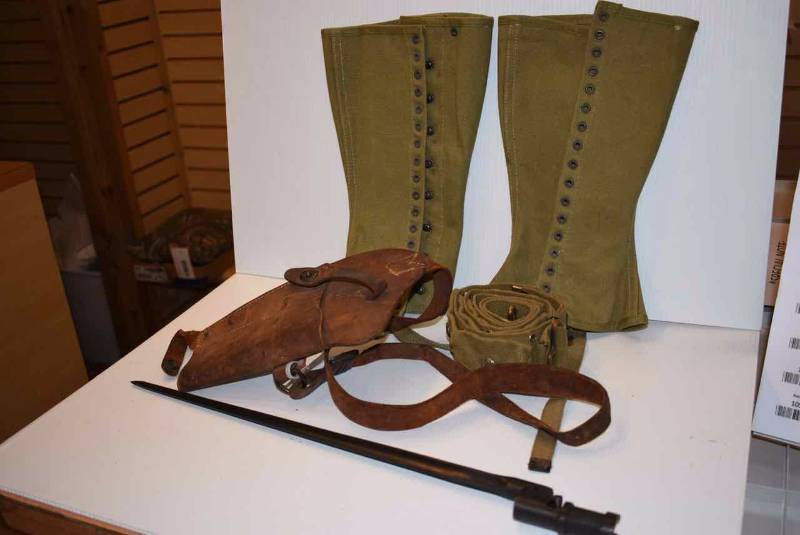 lot 1048 image: WWII Re-Enacting Items Leggings, Holster, Web Belt