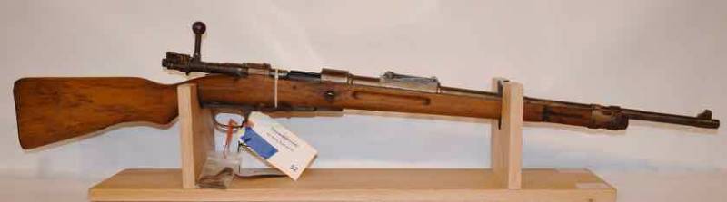 lot 52 image: Receiver, action, parts  Mauser  unknown model, 8MM Mauser  (sn  8106)  used parts