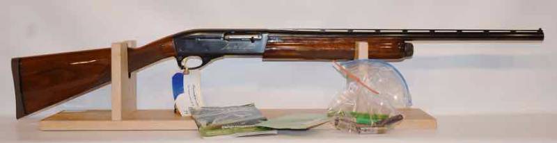 lot 71 image: Remington Sam Walton Limited Edition 1100 Semi-Auto,  20 ga  (sn  SMW200294)  new