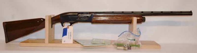 lot 72 image: Remington Sam Walton Limited Edition 1100 Semi-Auto,  12 ga. (sn  SMW120294)  new