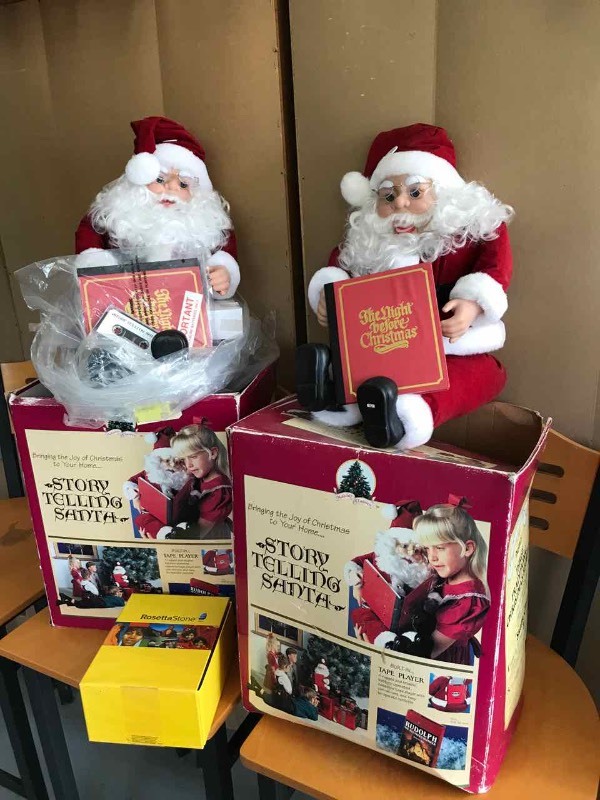 lot 23 image: (2) Story Telling Santas & Rosetta Stone Language Learning