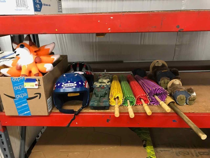 lot 113 image: (2) Plush Smokey The Bears, Paper Parasols, Plastic Army Tanks, Bicycle Helmets, Asst. Plush BearsFox