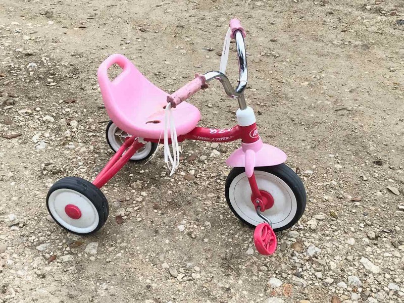 lot 228 image: Abandoned Tricycle  Radio Flyer (pink)
