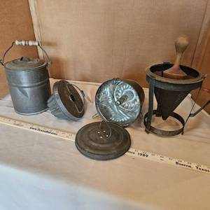 lot 743 image: Antique tin kitchen ware ricer, jelly molds, lunchpail
